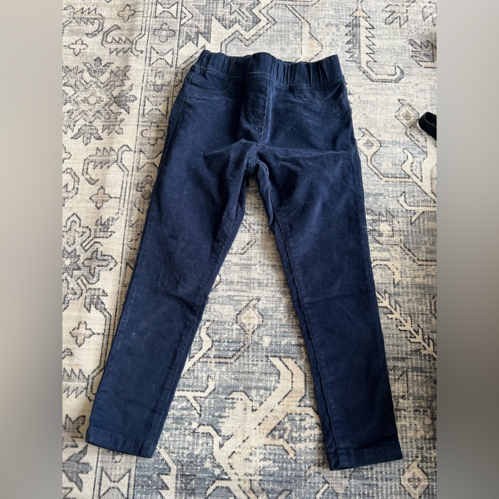 Never worn Mini Boden Corduroy pants in blue. Skinny back pockets elastic waist